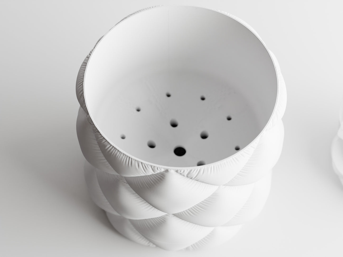 Inflated cloth plant pot with wall mount and drip tray